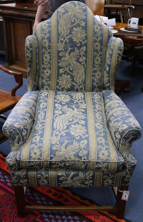A George III style wingback armchair